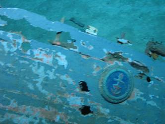 Close-up of ship's boat badge